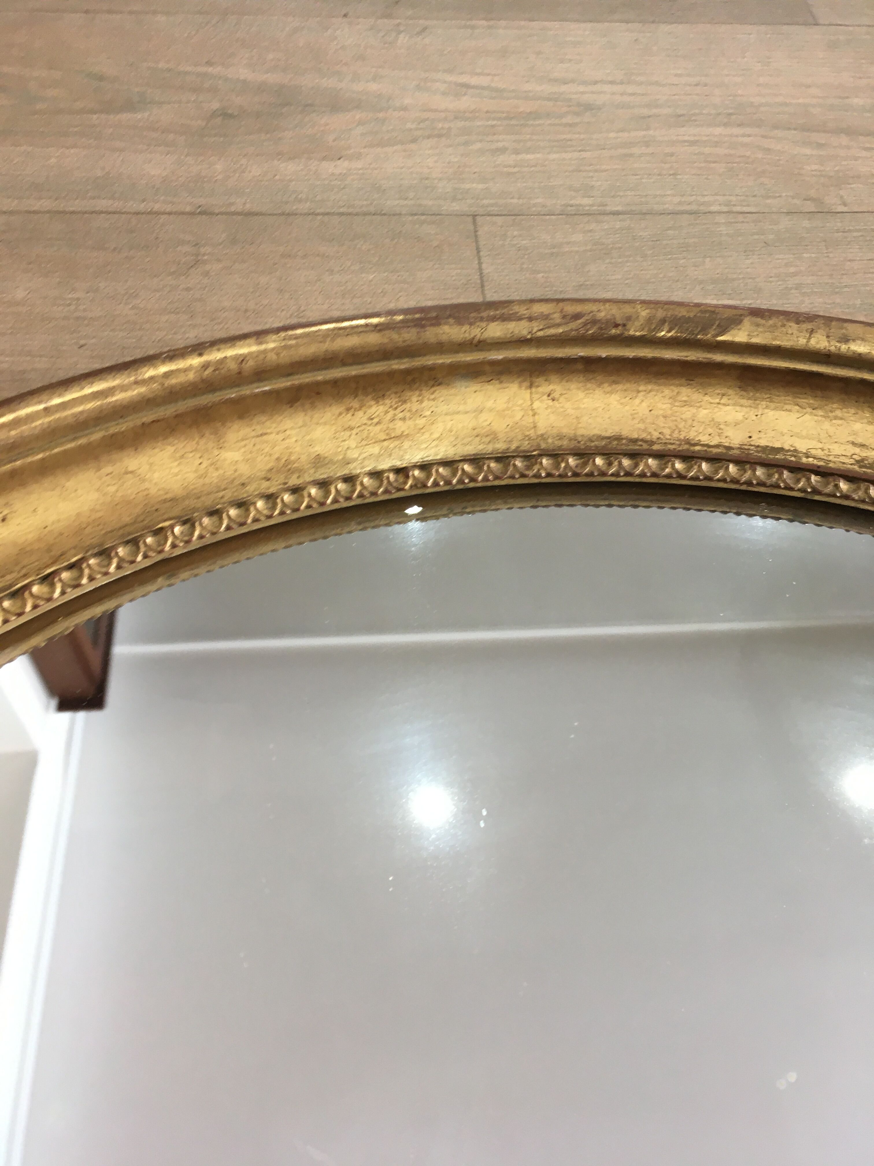 Old mirror gilded wooden frame.