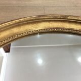 Old mirror gilded wooden frame.