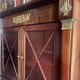 Cabinet, wardrobe or mahogany and ormolu wine bar in French Empire style with four doors.