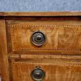 Louis XVI period chest of drawers in marquetry on mahogany background around 1780