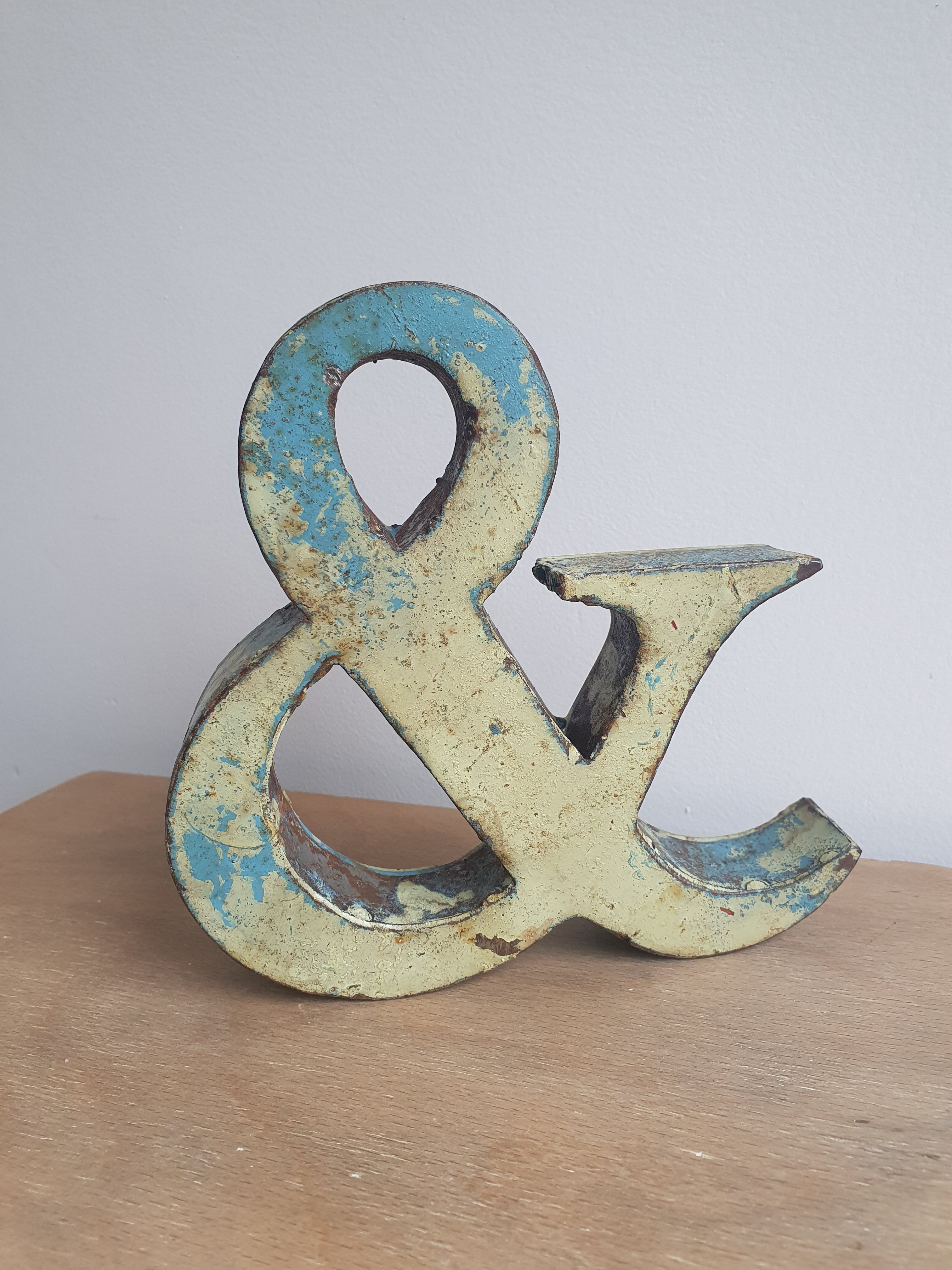 Ancient iron letter