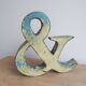 Ancient iron letter