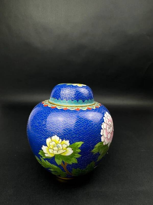 Chinese cloisonné vase decorated with peonies on a blue background, height 15 cm