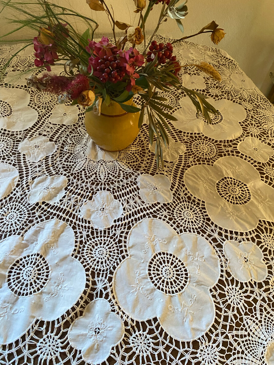 White cotton tablecloth with crochet lace.