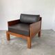 Modernist armchair in exotic wood and leather