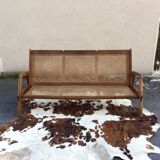 caned teak bench