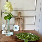 Old enameled cast iron trivet