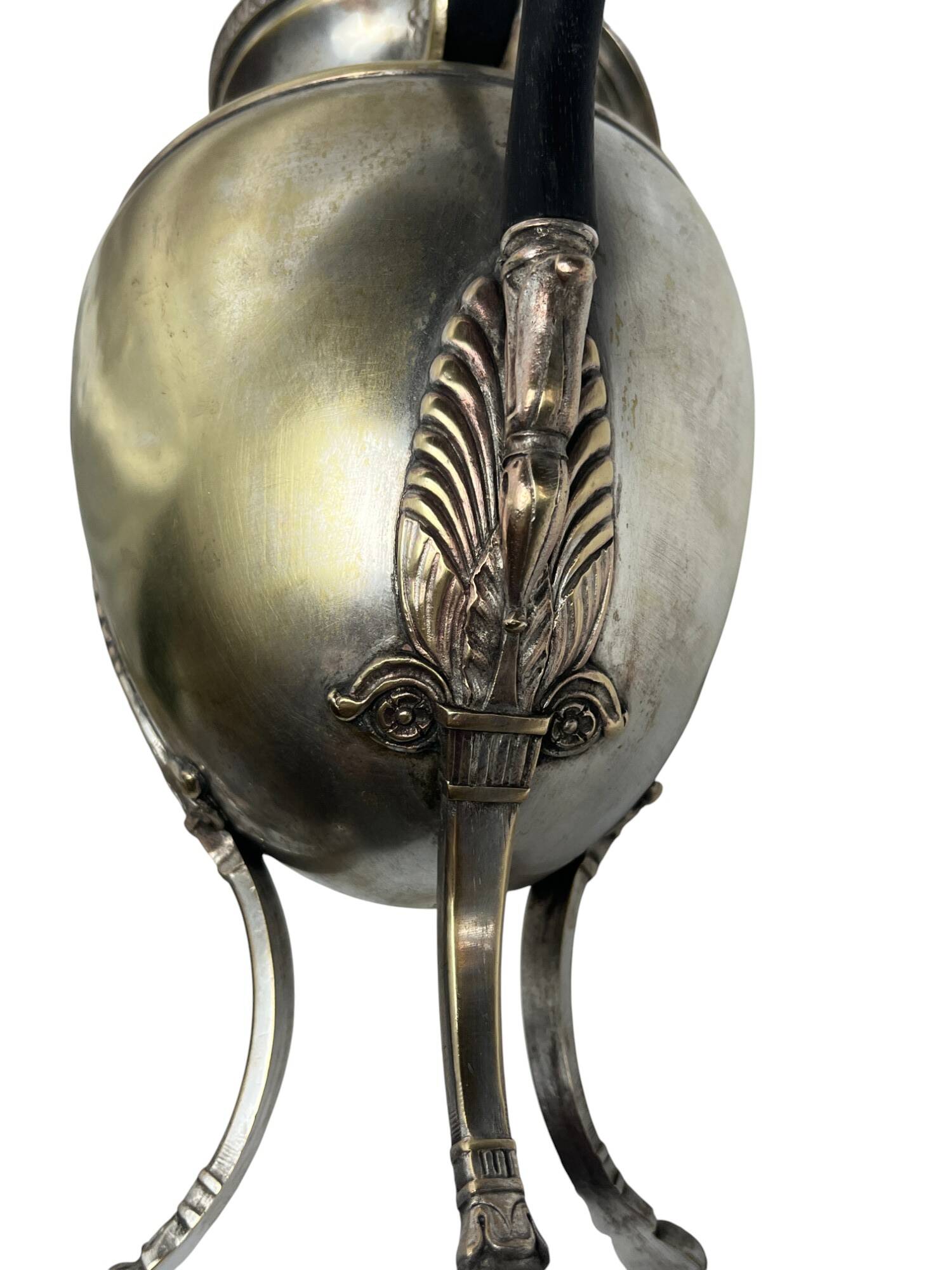 Set of three silver-plated tripod jugs, Empire, late 19th century