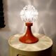 Space age lamp in orange glass and metal, around 1960.