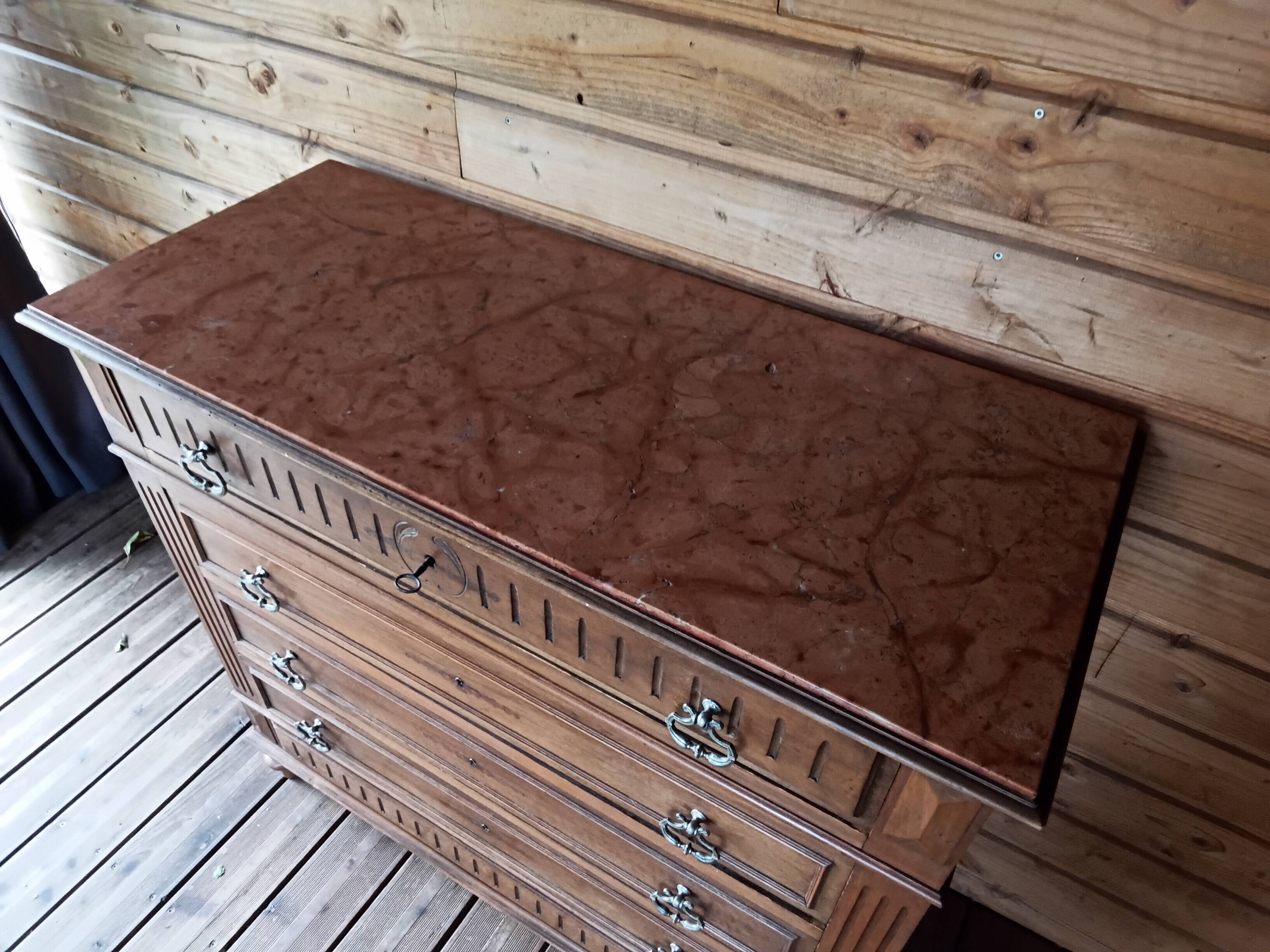 Antique chest of drawers with marble top