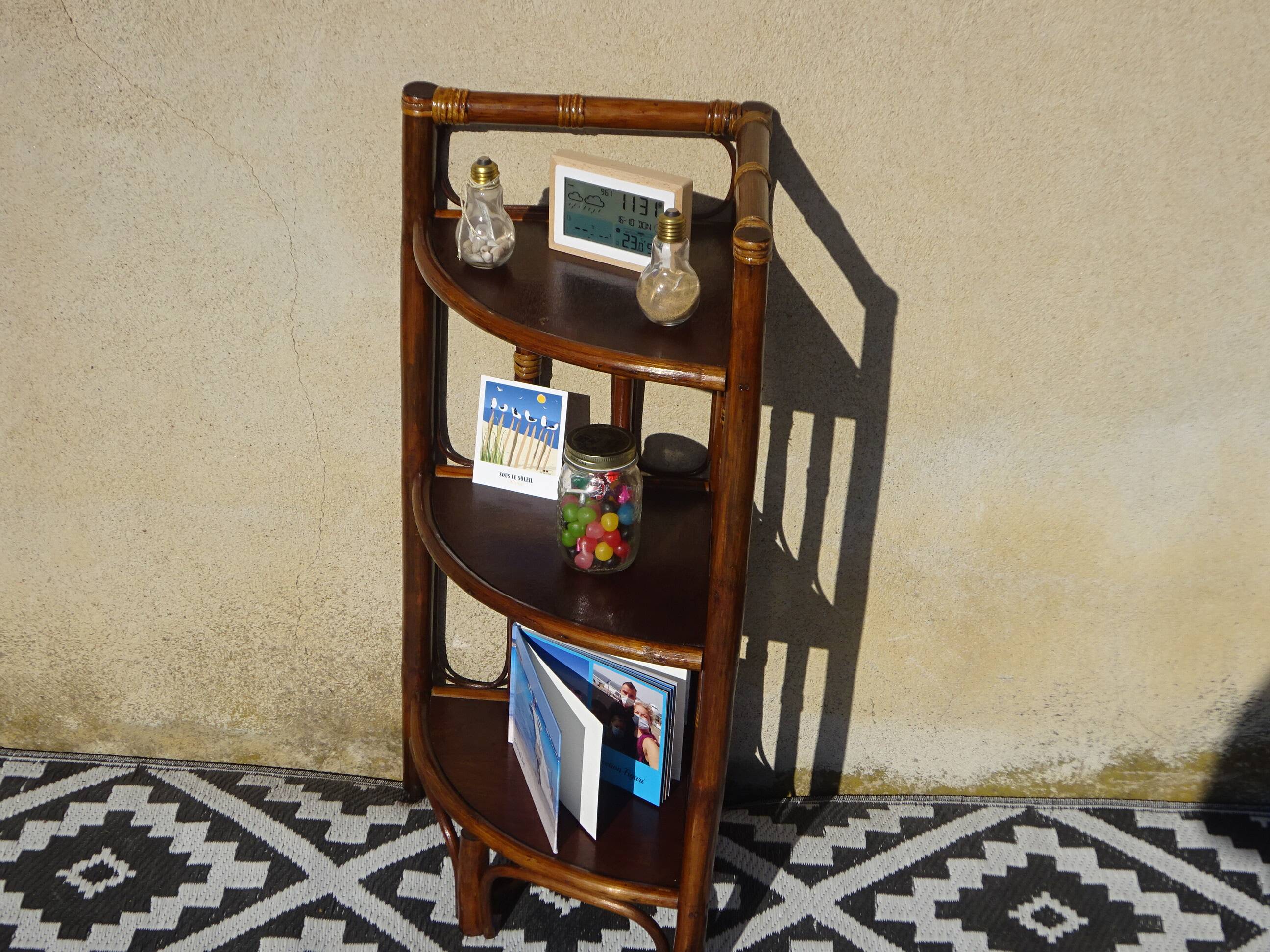 Rattan and bamboo bedside tables, both.