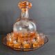 Liquor service in pink moulded glass