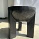 Black mango wood tripod side table with a semi-spherical top, height: 45 cm, diameter: 44 cm.