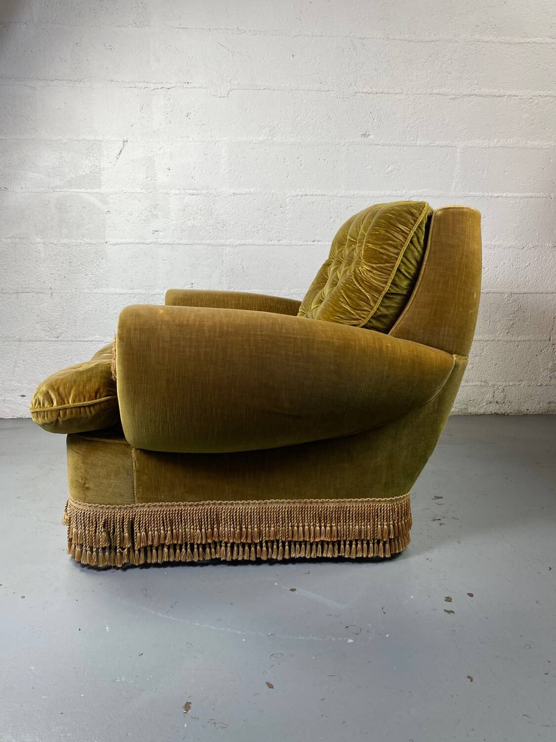 Fauteuil club vintage en tissu vert