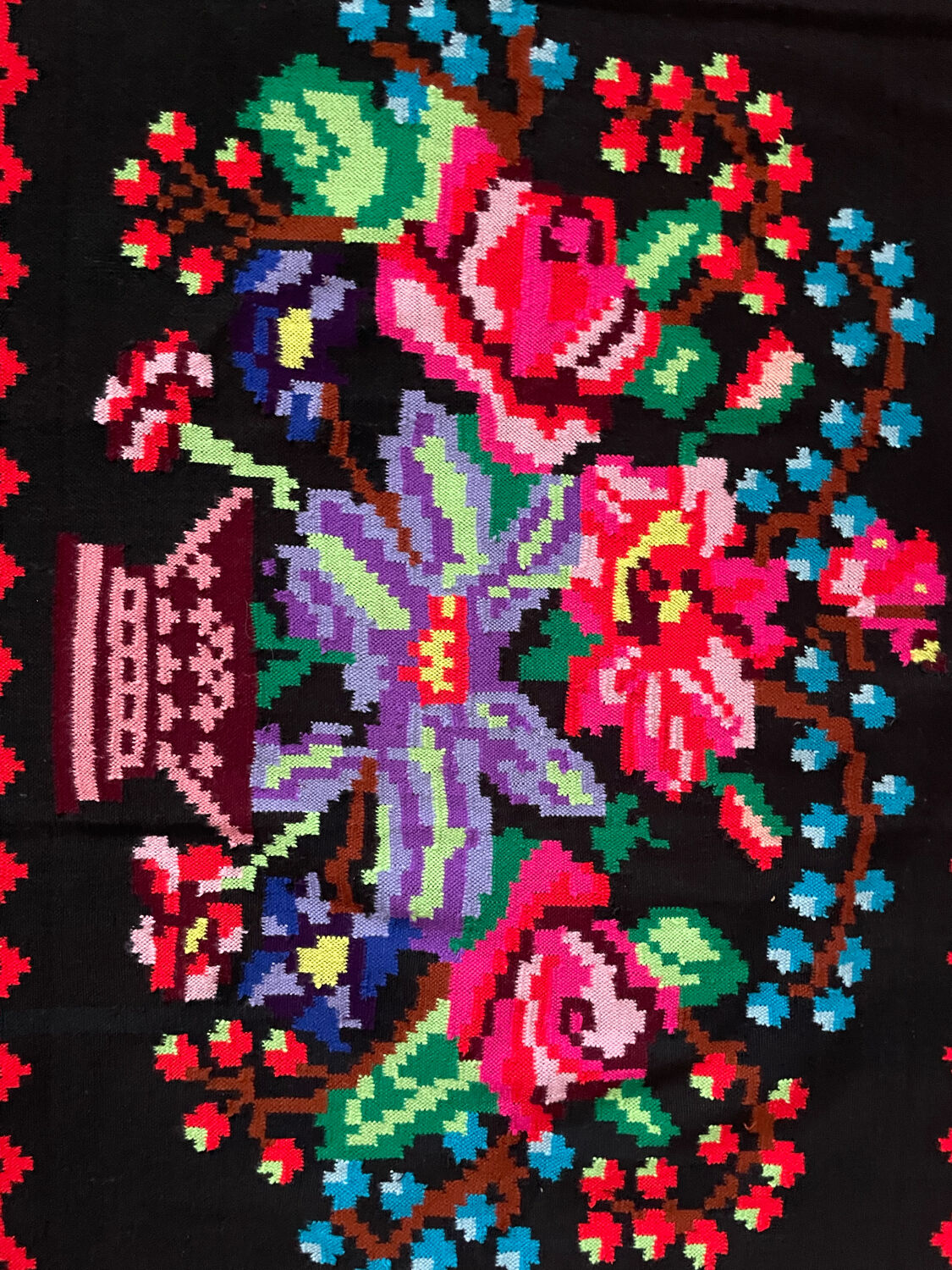 Vintage Romanian handwoven carpet with floral colorful design