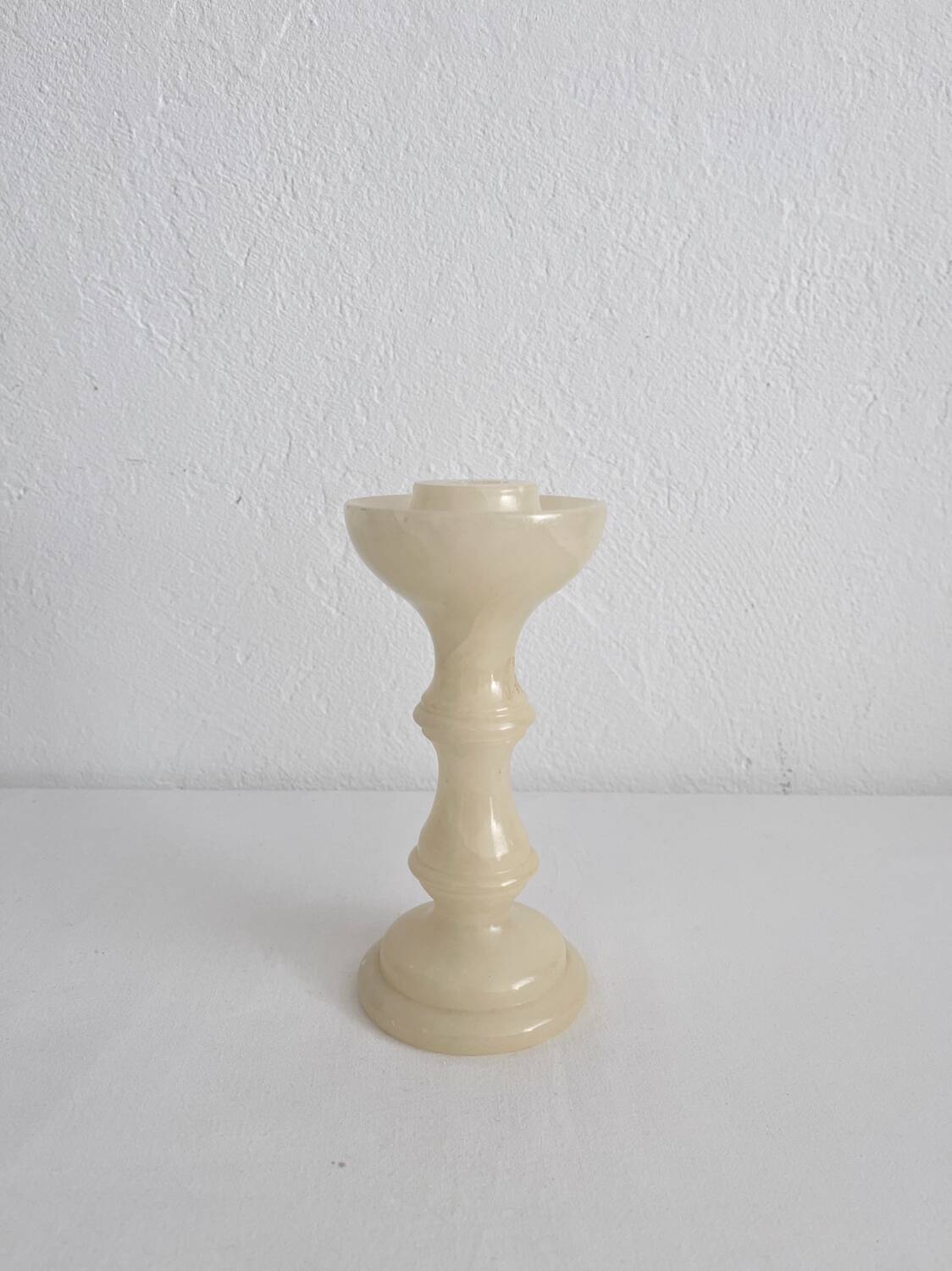 Vintage alabaster-style resin candlestick holder