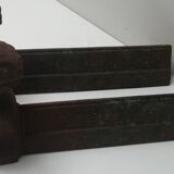 Pair of cast iron fireplace chenets "children"