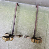 Old brass chenets & fleur de lys cast iron