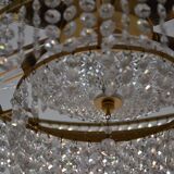 Old chandelier with tassels and brass