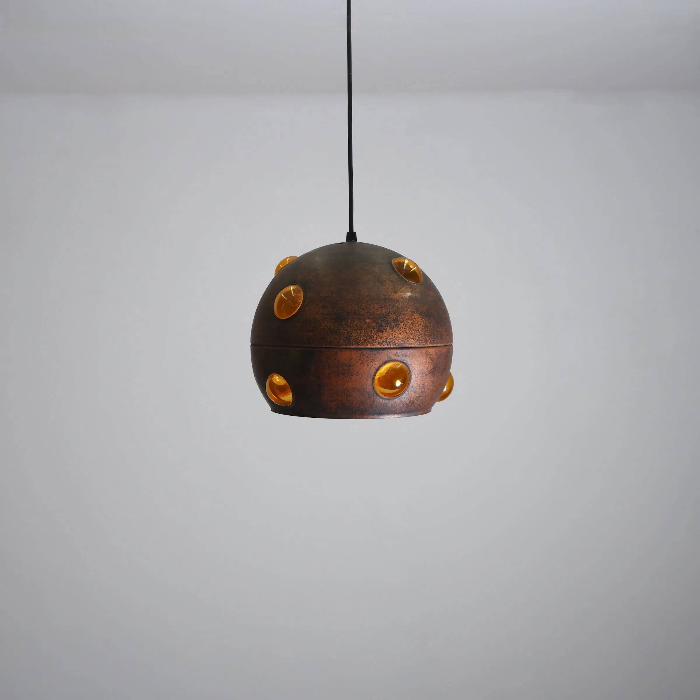 Large, globular brutalist hanging lamp in copper / glass by Peill & Putzler