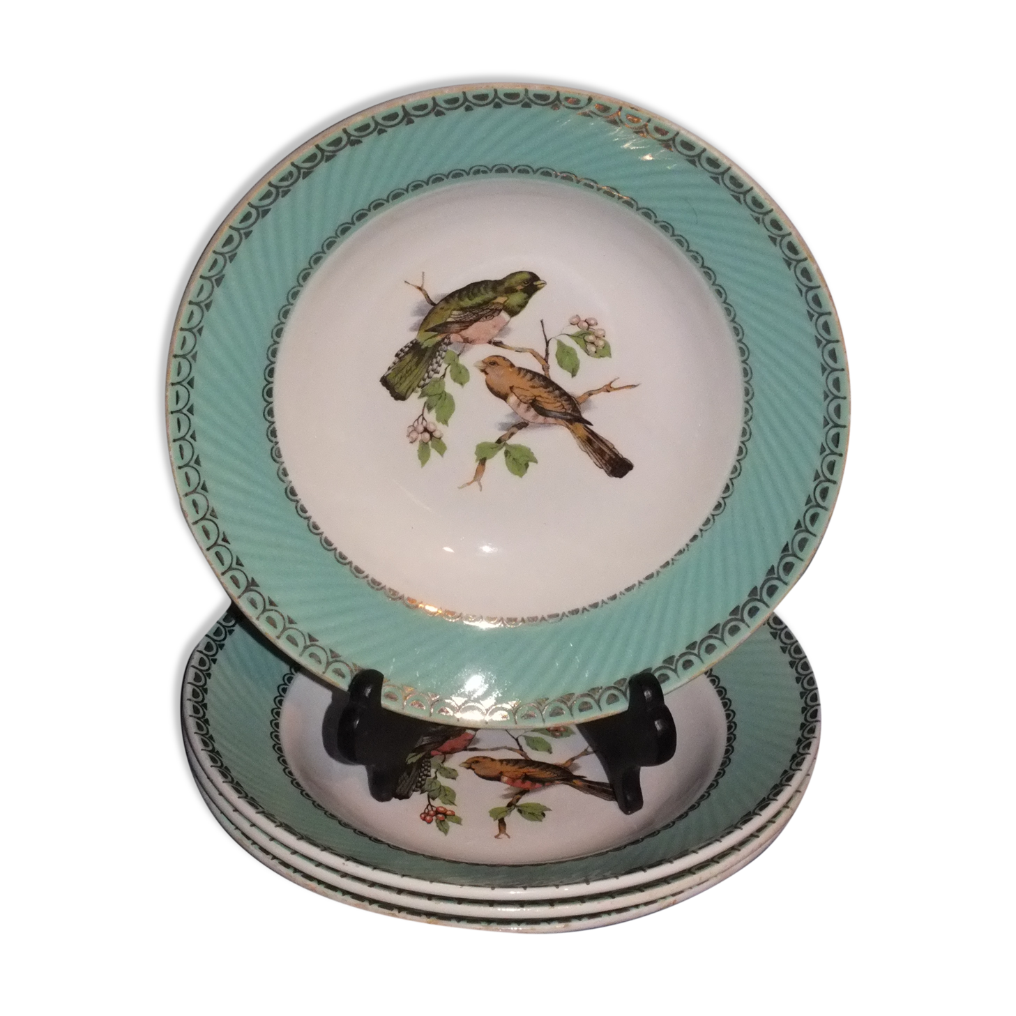 4 vintage hollow plates decorated with birds