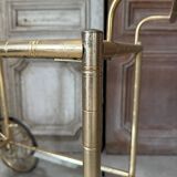 Vintage gold bar cart serving trolley