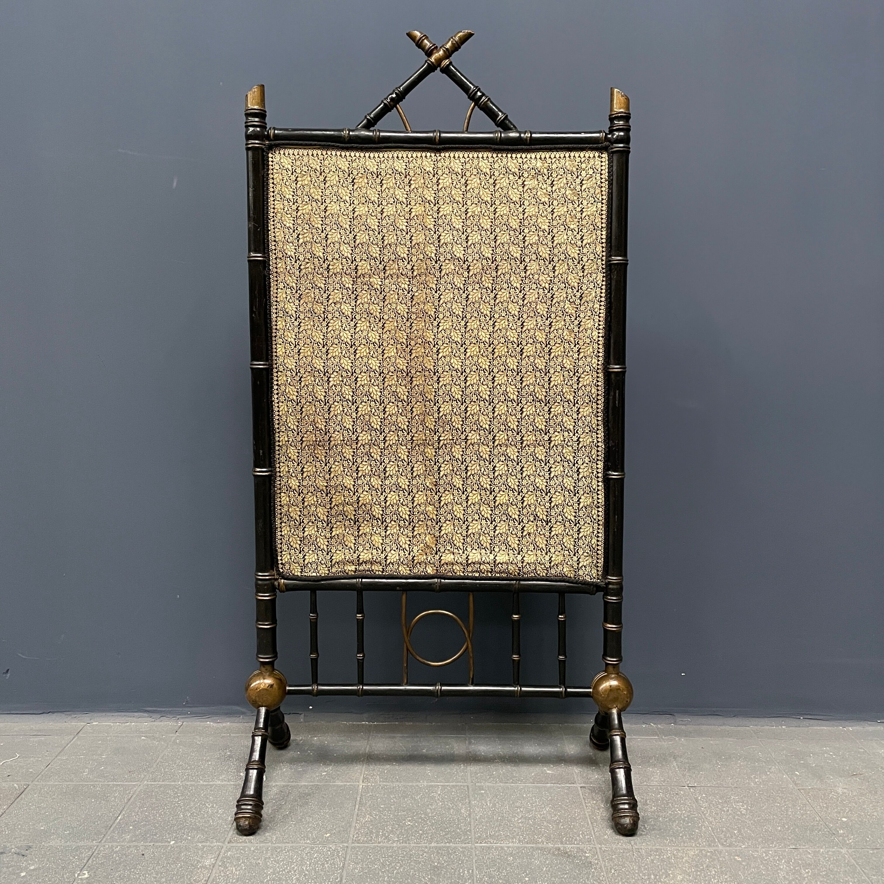 Antique black and gold faux bamboo fireplace screen