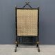 Antique black and gold faux bamboo fireplace screen