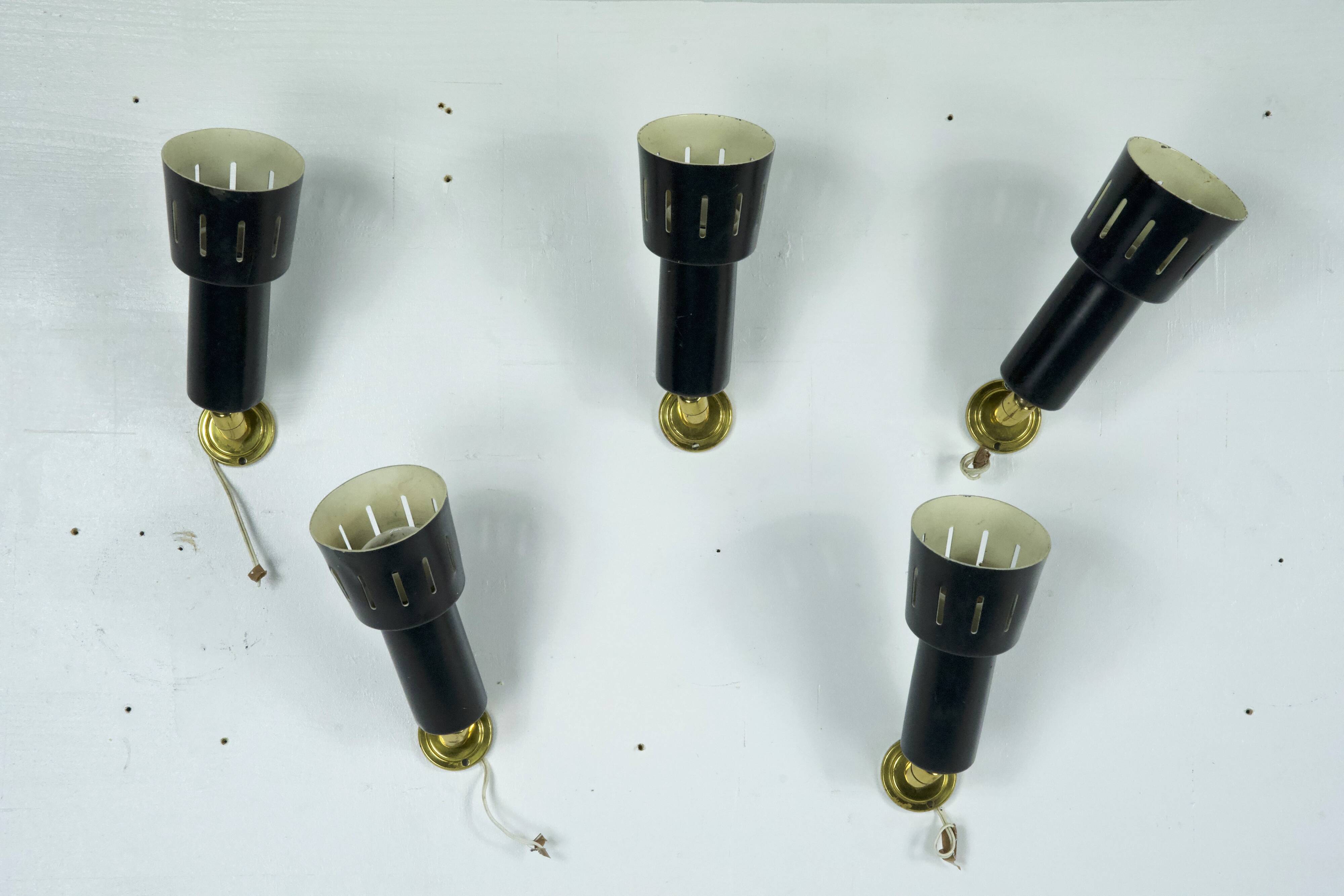 Set of five Stilnovo style spotlights in brass and lacquered metal. Italy