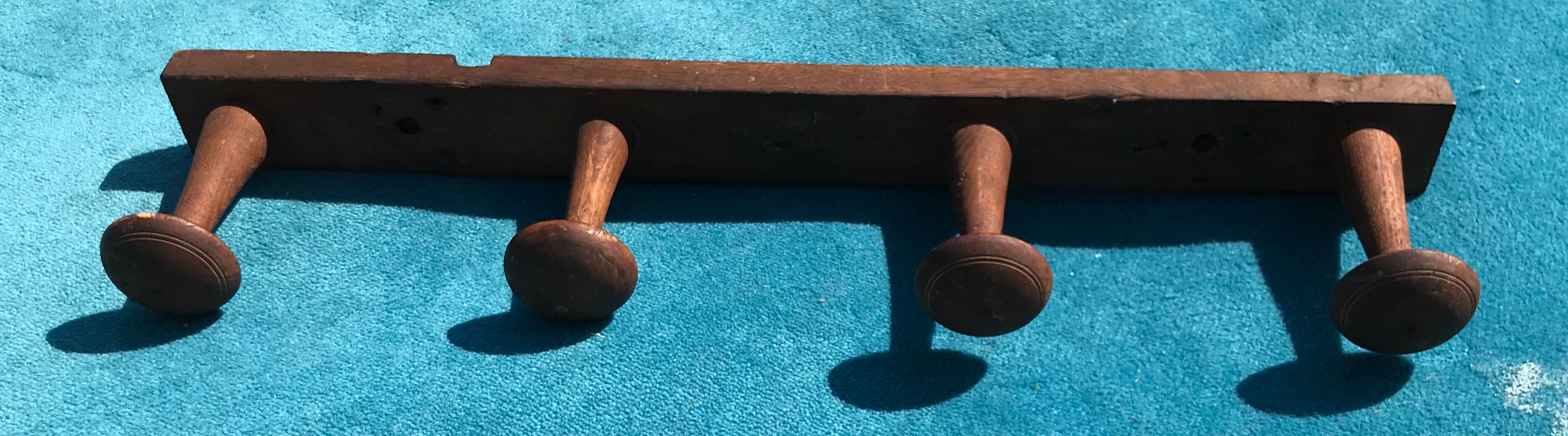 Wooden wall coat holder