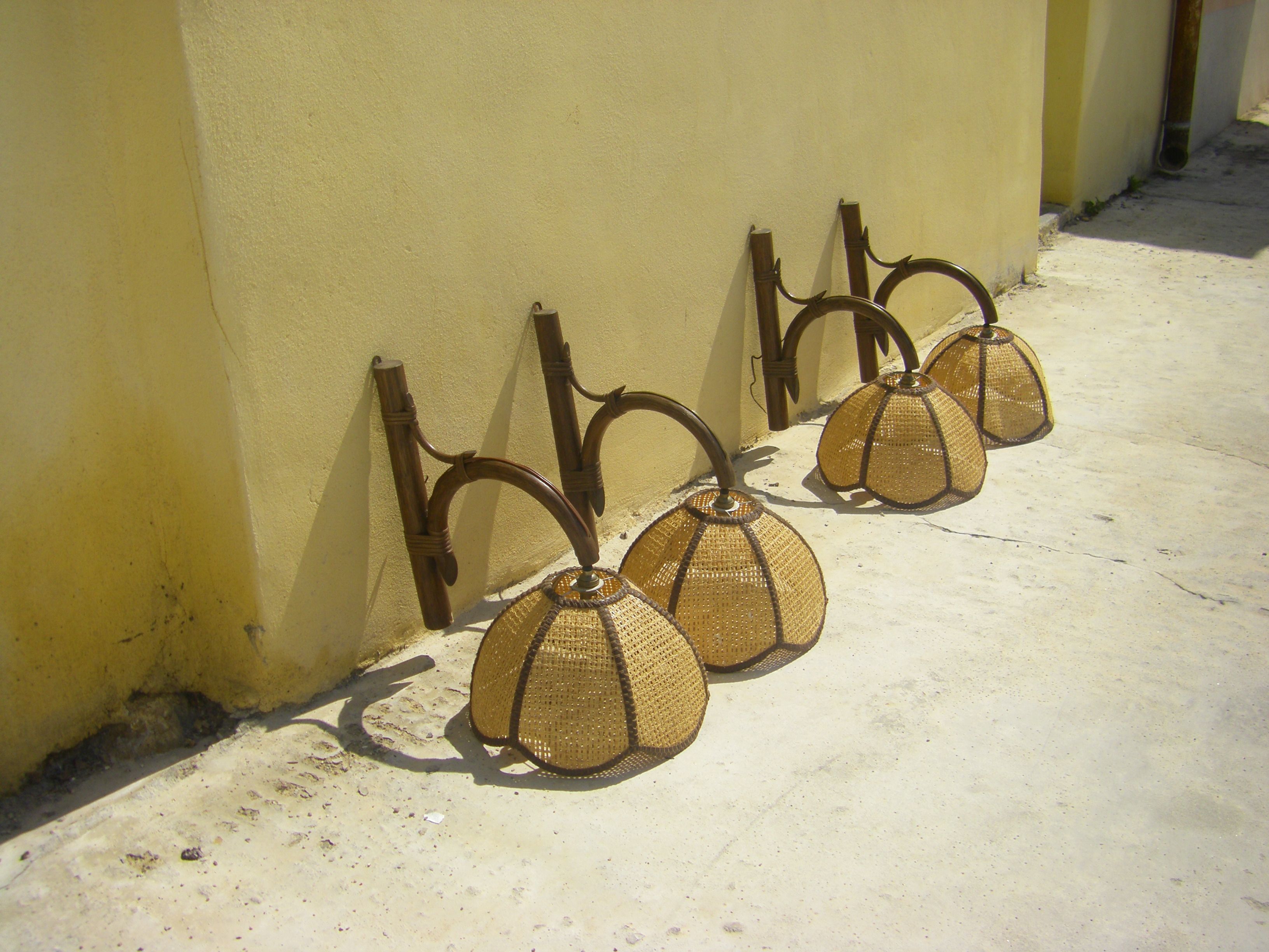 Four vintage rattan wall lamps