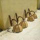Four vintage rattan wall lamps