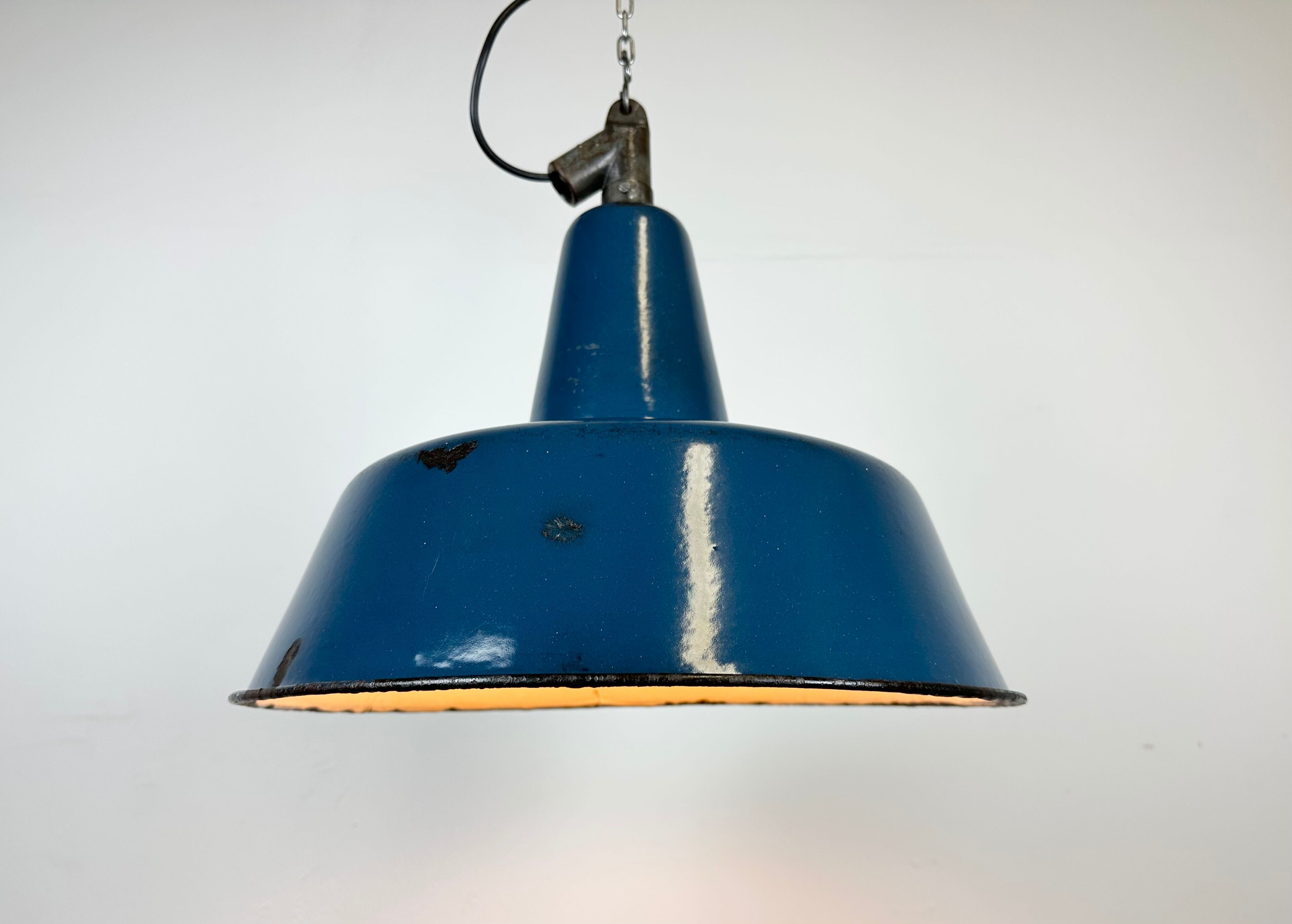 Industrial blue enamel factory lamp with cast iron top, 1960s