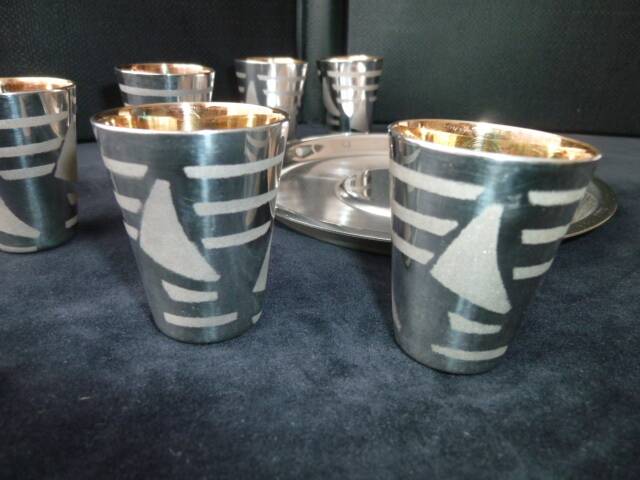 Liqueur service, silver-plated metal shot.