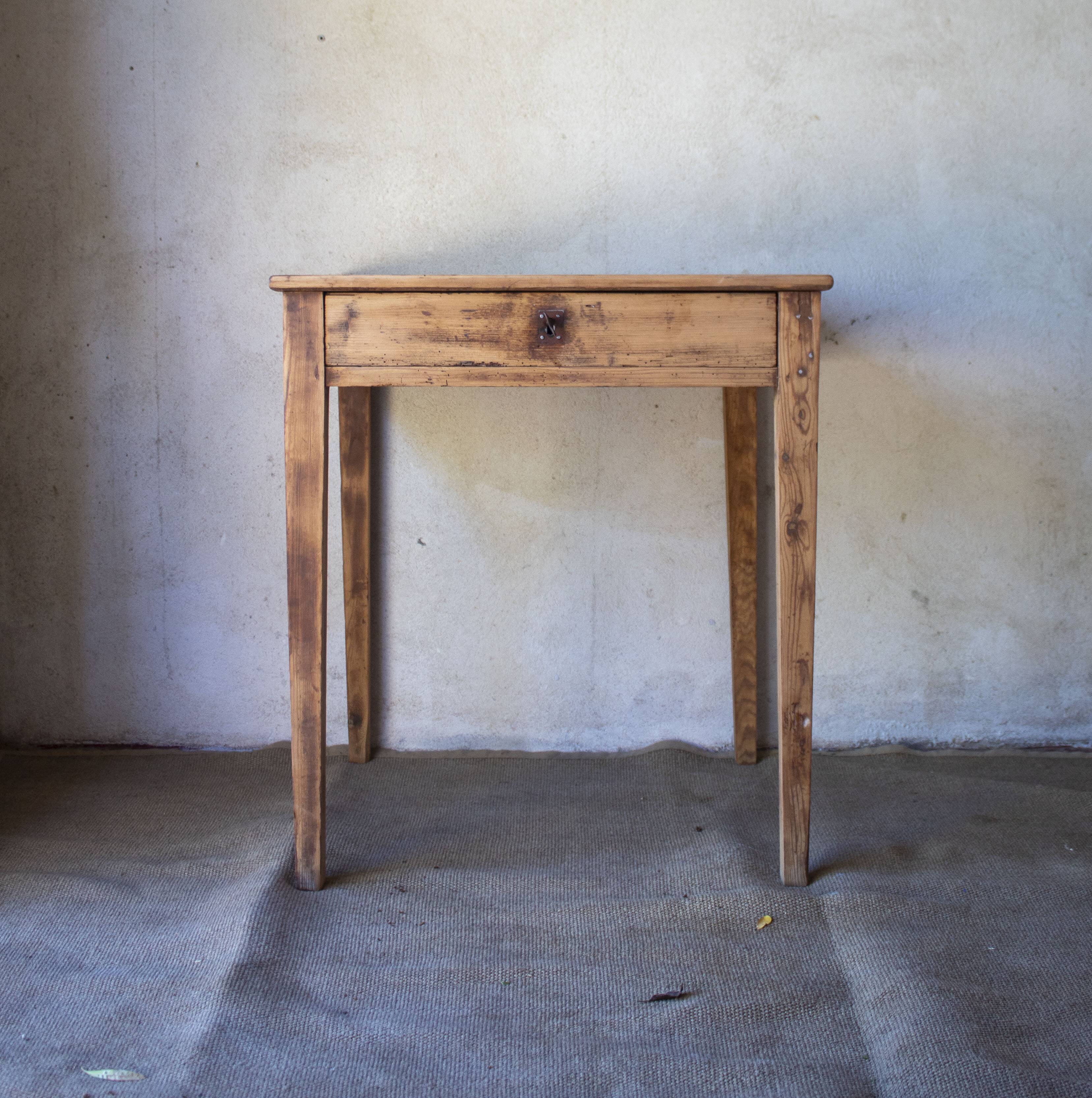 Small vintage desk made of solid wood.