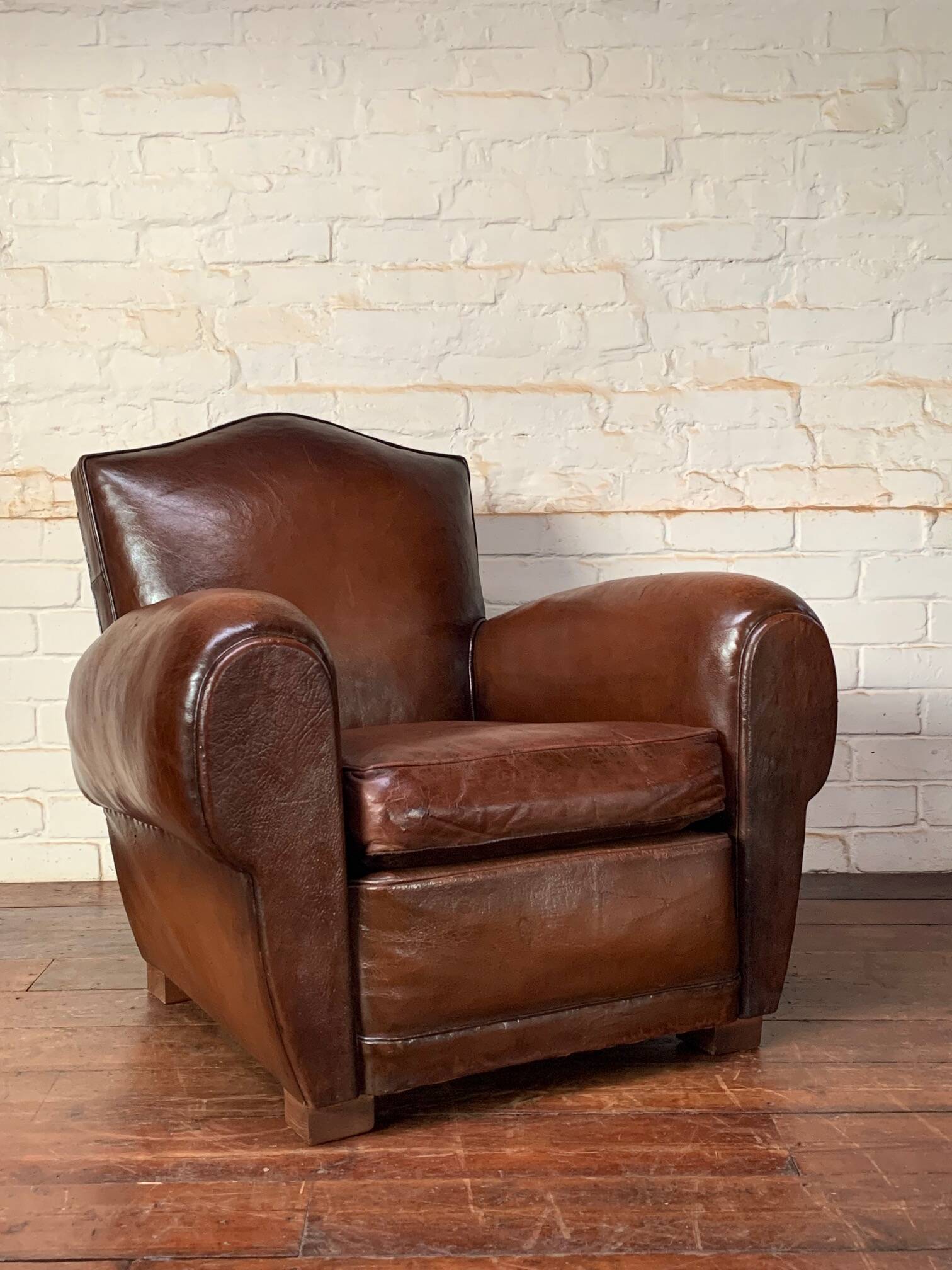French leather club chair, chapeau de gendarme model circa 1950’s