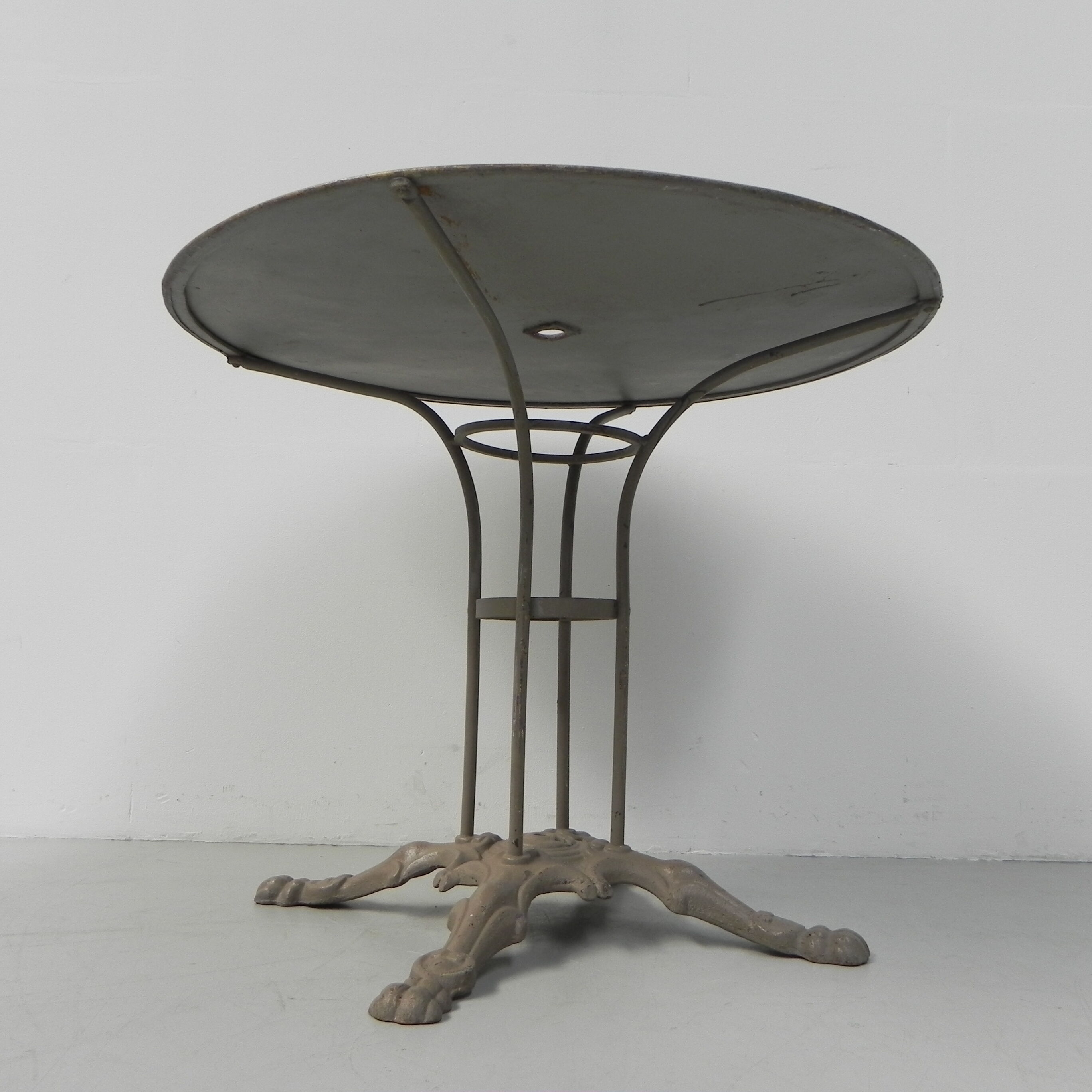 Steel garden table on cast iron base