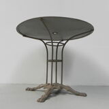 Steel garden table on cast iron base