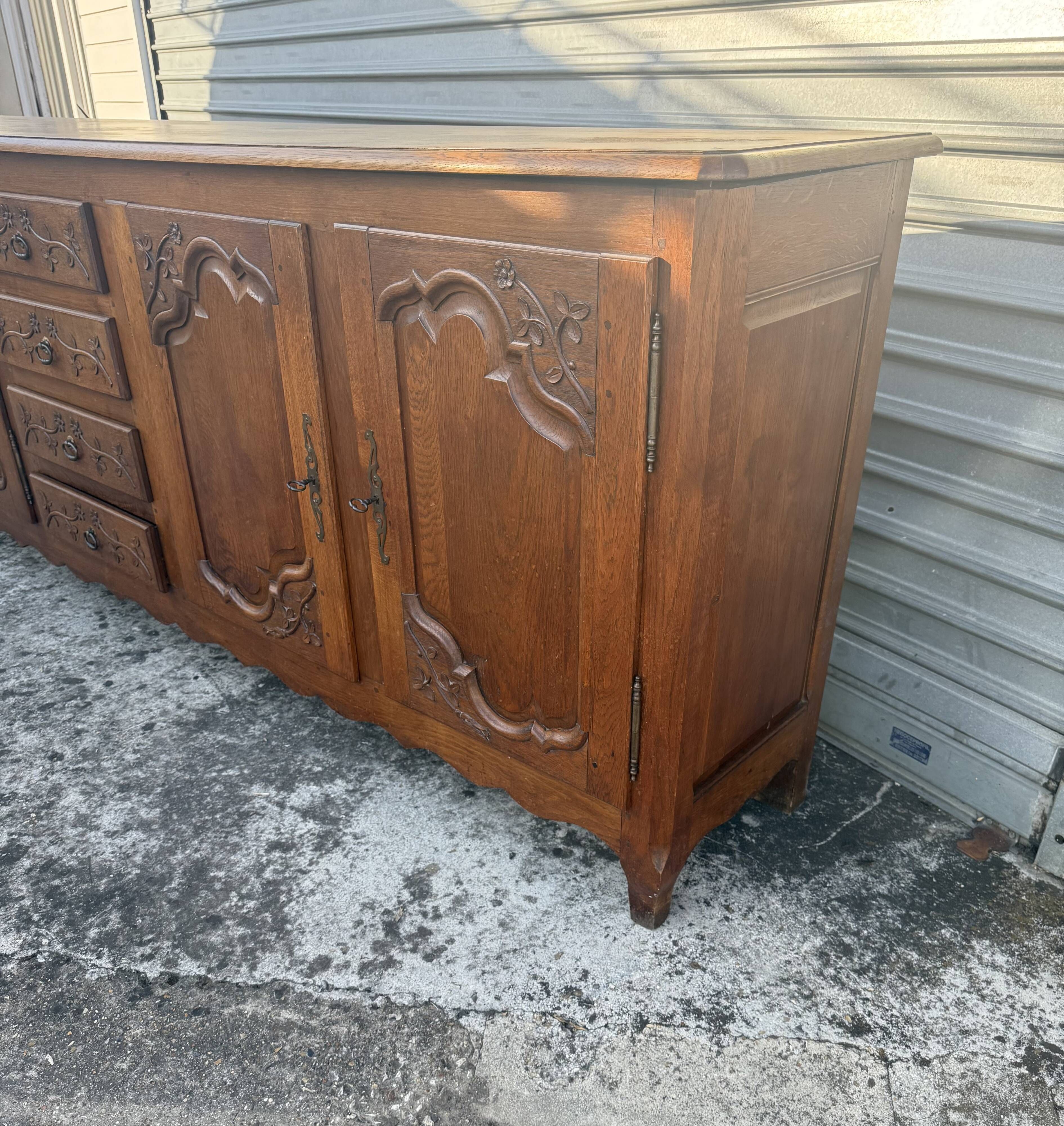 Picard enfilade in Louis XV style made of solid oak.