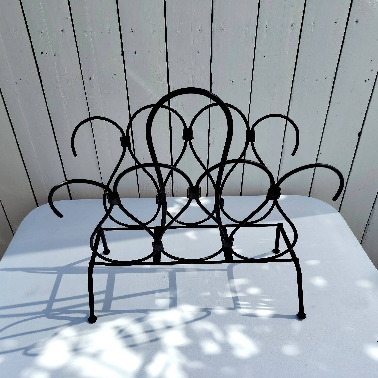 Metal and leather magazine rack, attributed to Jacques Adnet, vintage