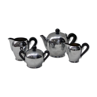 Bombé tea service designed by Carlo Alessi in 1945 for Alfra Italy. Silver stainless steel and black bakélite