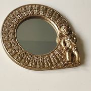 Shabby Chic round mirror. Putti/Cherub decor. Floral motifs. Dimensions: 20 x 20 cm.