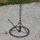 Vintage floor lamp from the 50s in blackened iron in the shape of a chain
