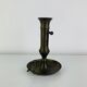 Vintage brass candlestick that raises and lowers.
