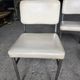 4 chrome metal chairs with faux leather from the 1970s.