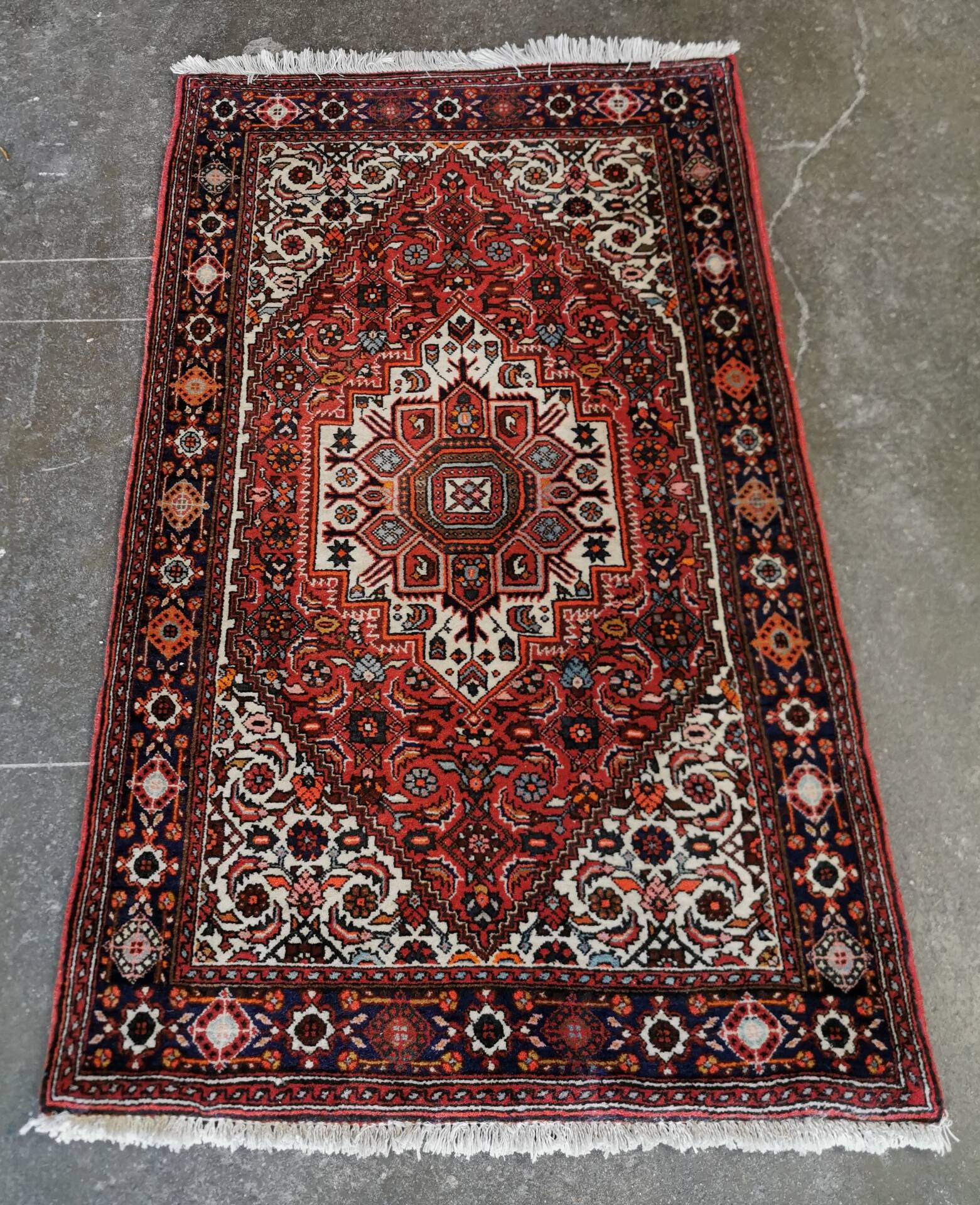 Hand-knotted Persian carpet from Iran, 128 x 76 cm.
