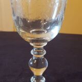 Six engraved crystal wine glasses. 1930