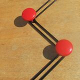 vintage black and red iron coat rack