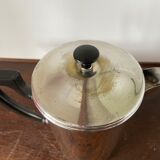 Old silver metal piston coffee maker