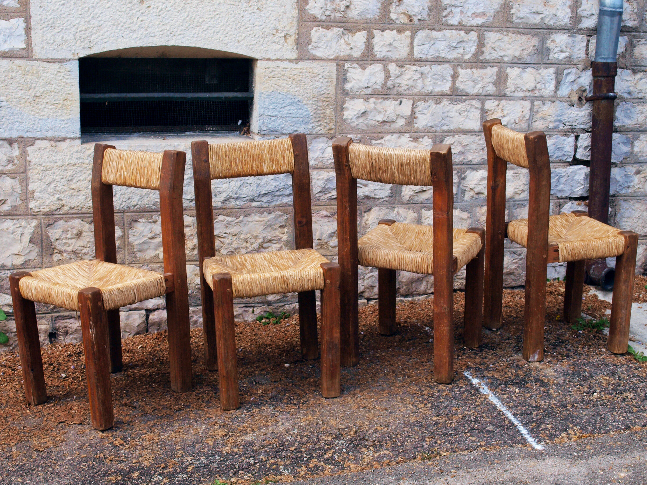 Brutalist chairs in pine and straw, France, 1950s, set of 4